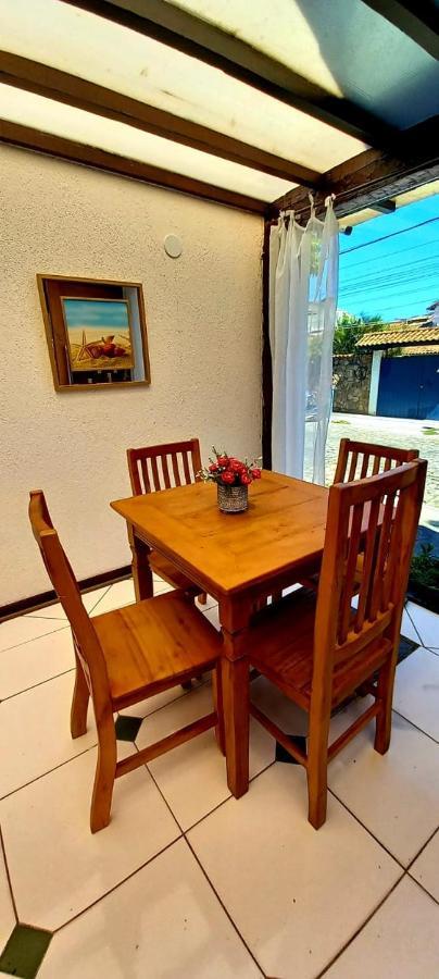 Bliss Hoteis Centro Búzios Exteriér fotografie A dining room table with four chairs